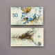 Illustration for article titled Gorgeous Banknotes Feature Flora, Fauna—And Skeletons Under UV Light